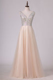 2024 Beaded Bodice V Neck Backless A Line/Princess Prom Dress With Tulle PMGCTYX5